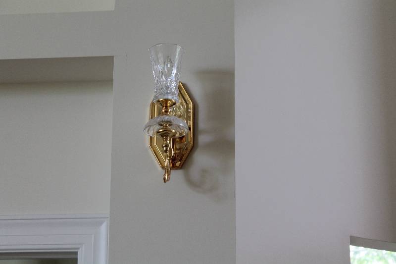 lot 47 image: Lot of (3) Matching Solid Brass Chandelier Light & Wall Light Fixtures (2) Glass & Metal Encasement Multiple Bulbs B8060-33 Requires Tools For Removal MUST HAVE KNOWLEDGE OF REMOVAL OF HOUSEHOULD ELECTRICAL LIGHT FIXTURES.