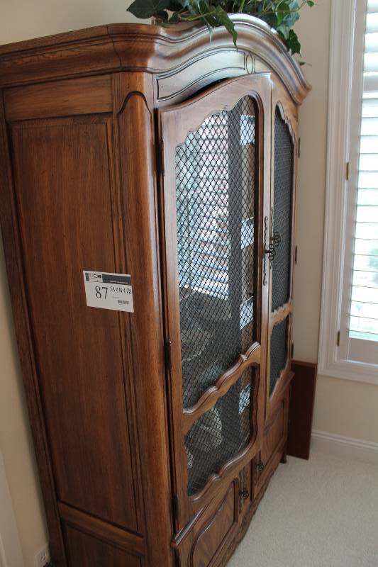 lot 87 image: Thomasville Wooden Cabinet wGlass Double Doors & Lower Drawers Contents Not Included 53 x 18 x 78.