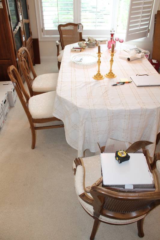 lot 94 image: Wooden Table Lot Including Wooden Table Wooden Chairs wWhite Upholstery & Arm Rests (6) 78x 42 x 28.