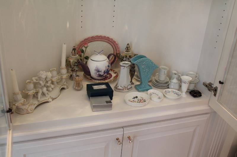 lot 98 image: Shelf Lot Including Decorative Candle Holder Vase Collectible Dish Ware And More.