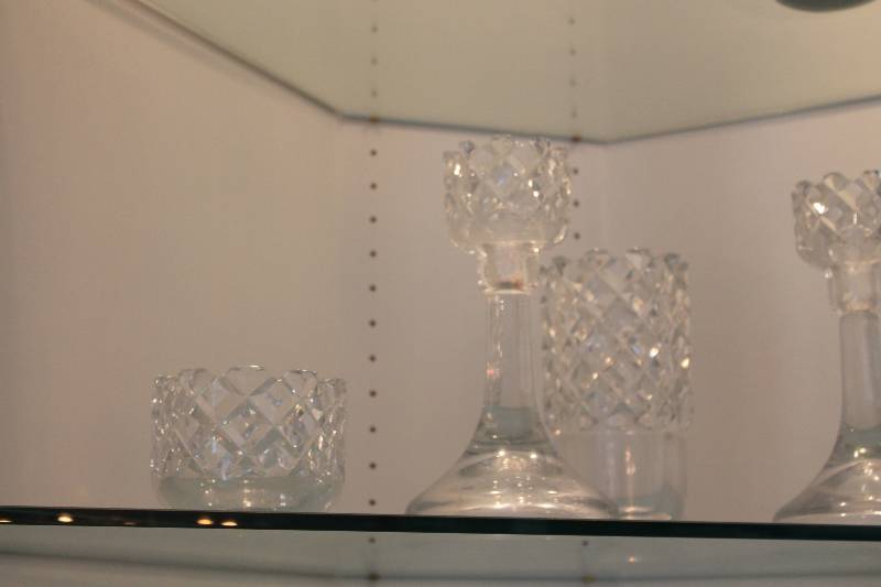 lot 96 image: Shelf Lot of Collectible Crystal Ware Large Glass Candle Holders Small Glass And More.