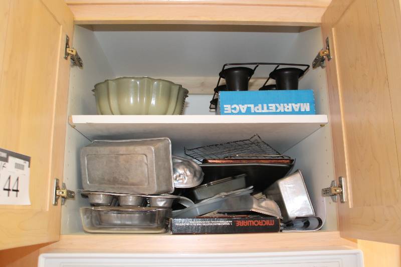 lot 144 image: Shelf Lot Including Metal Mixing Bowl Metal Baking Trays Plastic Mixing Bowl And More.