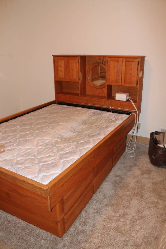 lot 156 image: Bed & Woooden Bed Frame Lot wLower Storage Drawers & Wooden Headboard wCubbies & Mirror 64 x 96 x 60.
