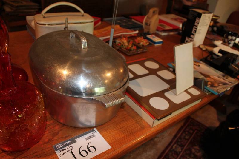 lot 166 image: Shelf Lot Including Metal Baking Dish, Picture Frame, Book And More.