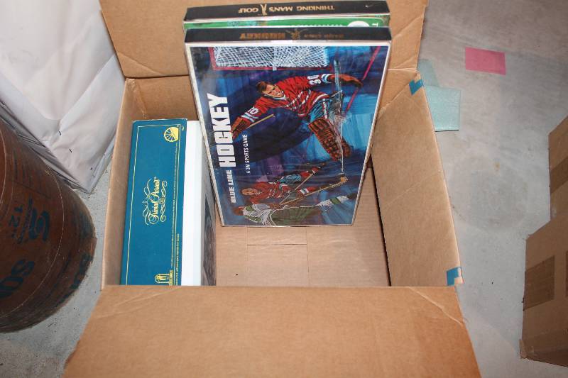 lot 175 image: Box Lot of Board Games Including Golf, Hockey, Trivial Pursuit, And More.