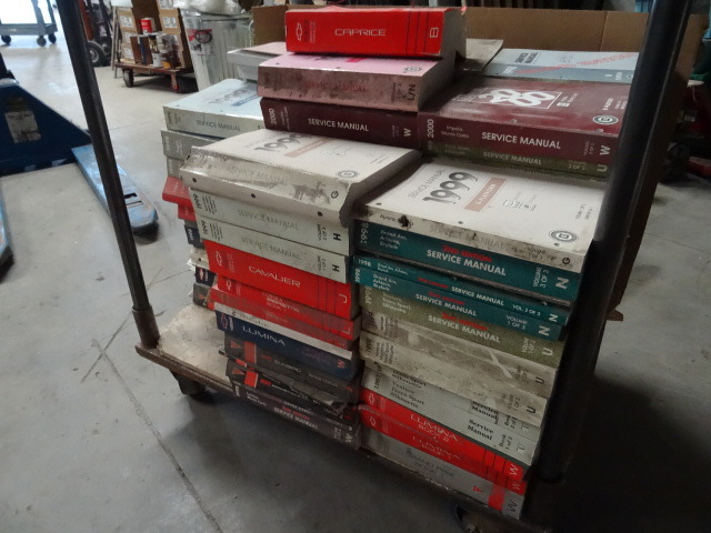 Cart full of GM repair manuals