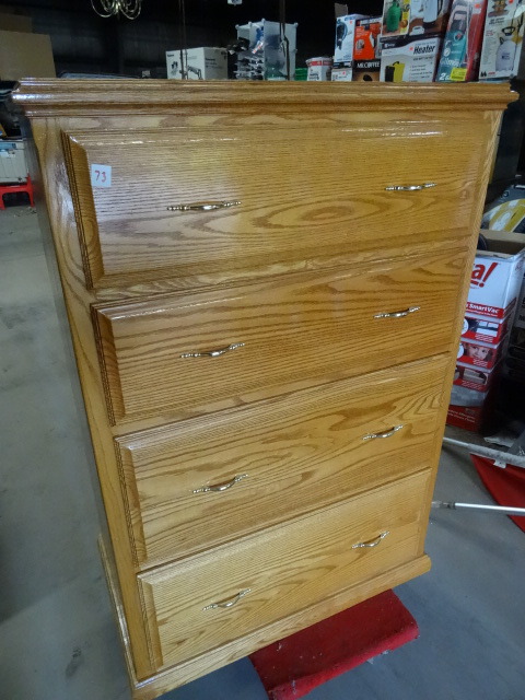 Solid wood 4 drawer dresser.