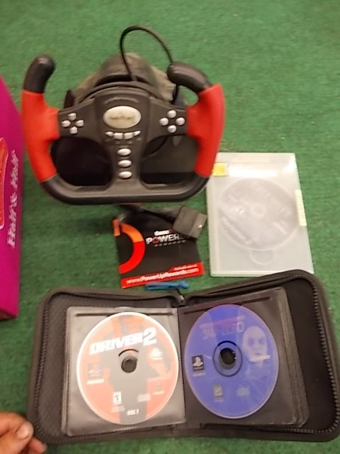 Playstation Games and Steering Wheel