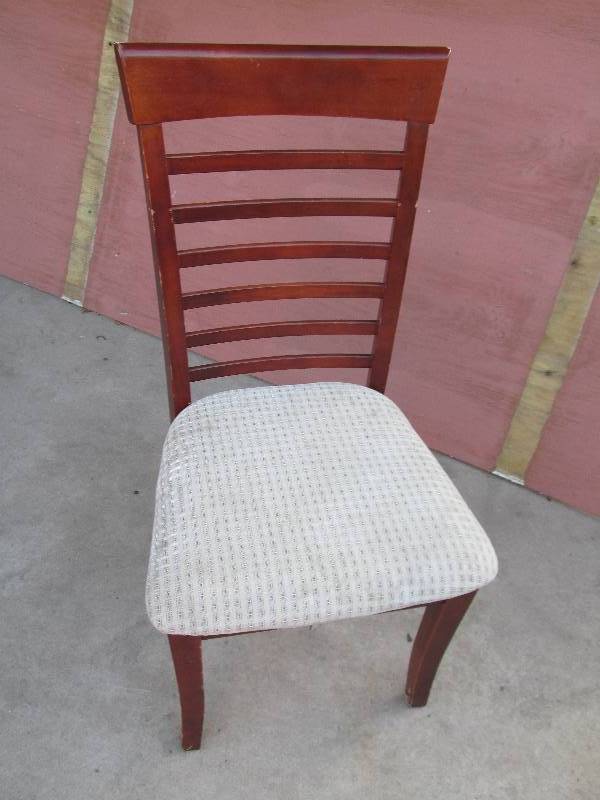 Wood chair with white upholstered c...