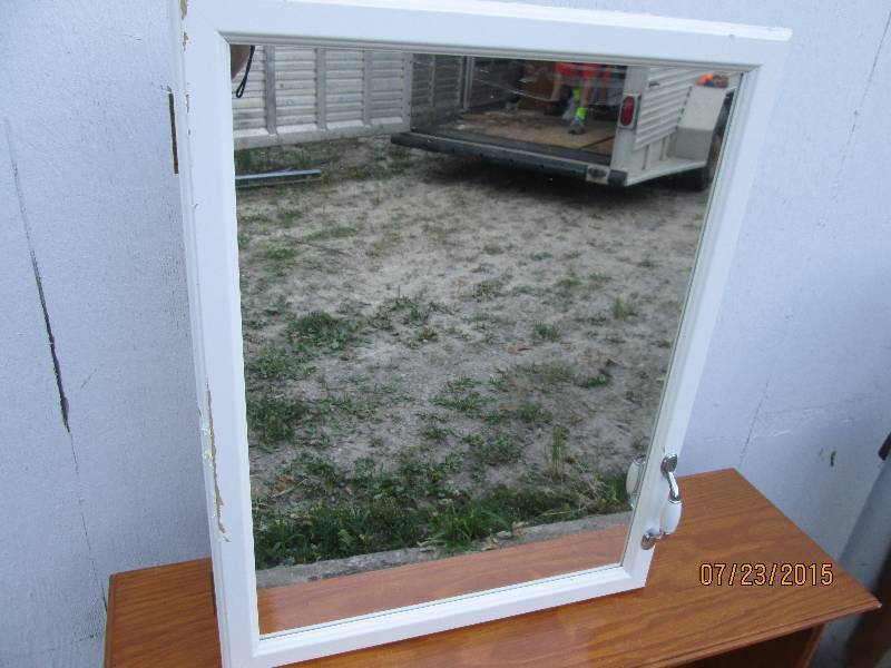 Mirrored medicine cabinet, 18 x 23...