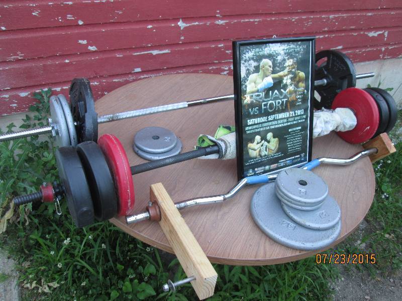 Assorted weights, curling bar and w...