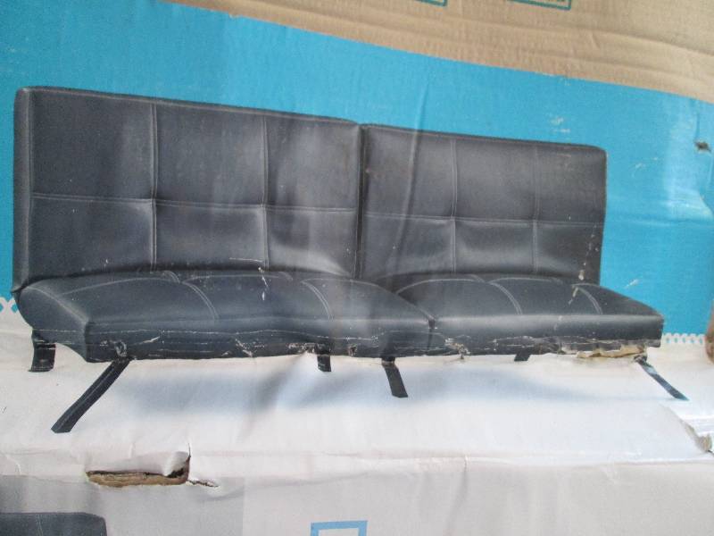 Folding couch, box is water damaged...