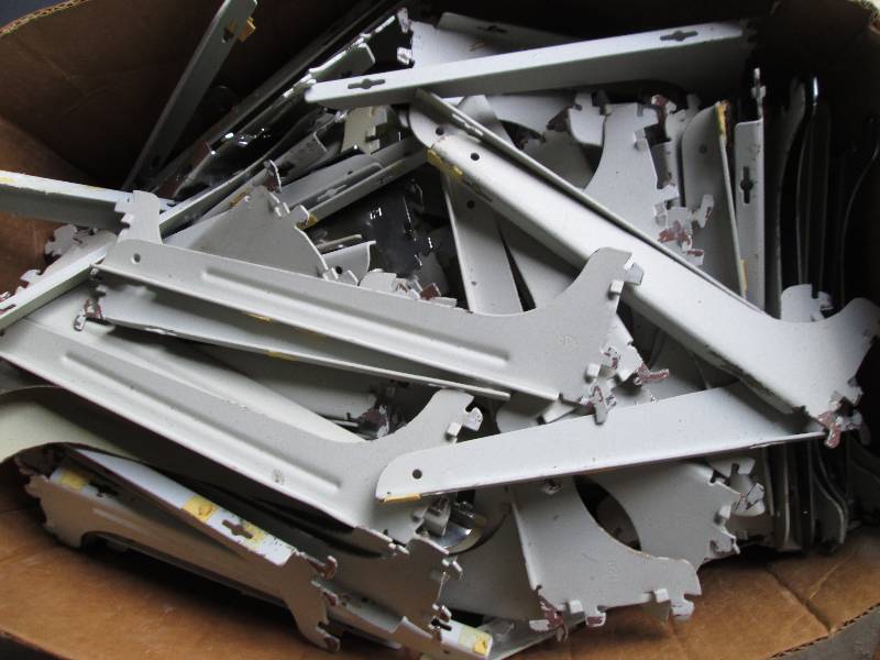 Box of shelf brackets, lots of meta...