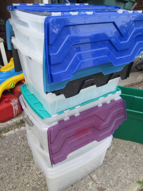 10 plastic totes, some have flip li...