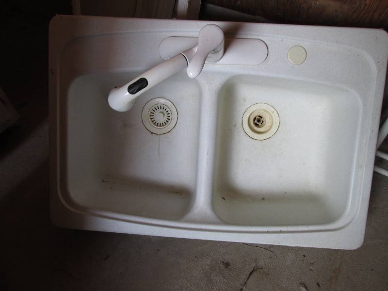 Double sink with drains and a spray...