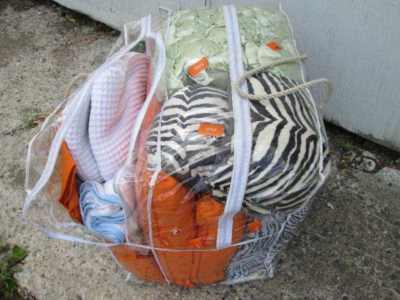 Large bag of clean folded bedding a...
