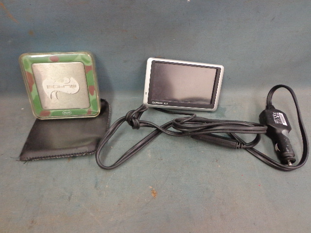 lot 40 image: Garmin Nuvi GPS Navigator and Scale