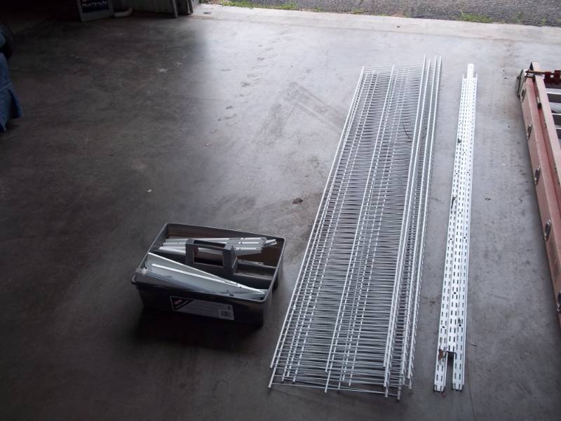 lot 9 image: 5 Wire shelves with hardware and brackets, 12 x 6