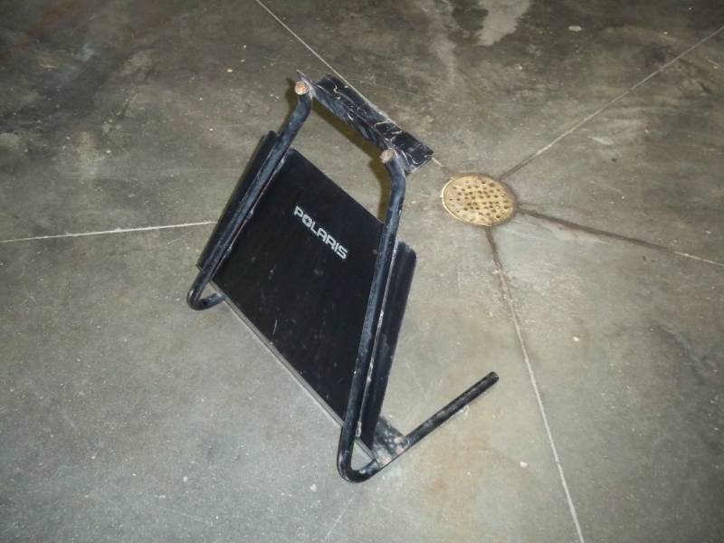 lot 74 image: Polaris Snowmobile stand