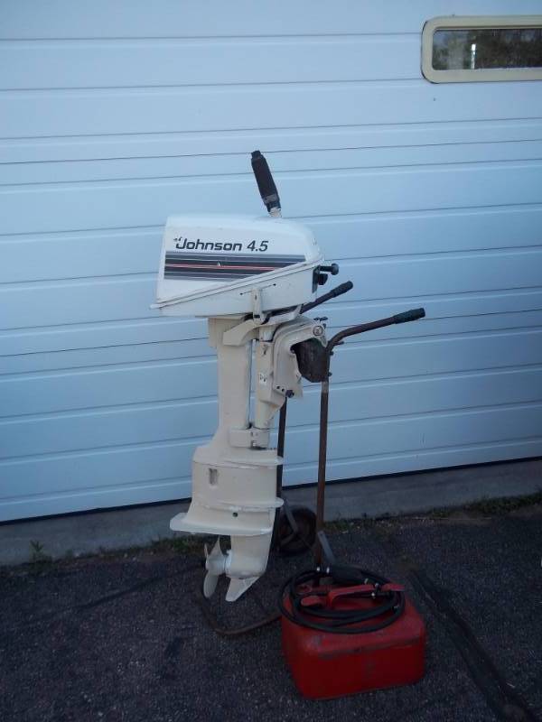 lot 150 image: 1982 Johnson 4.5 Outboard motor long shaft and tank, tested and runs, stand not included