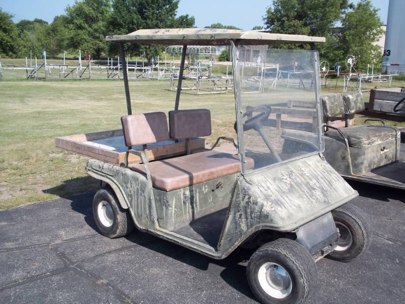 lot 157 image: Electric Golf Cart with windshield and sun roof, consignor states runs last time used, needs new batteries