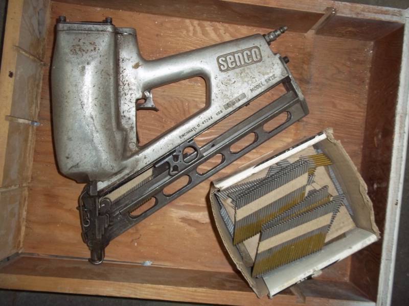 lot 171 image: Senco Nail gun Model SN Four with box of nails