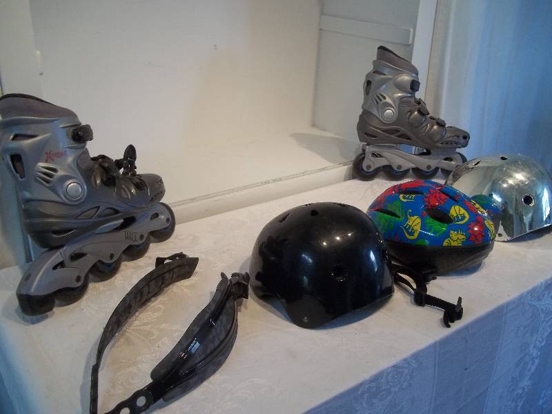 Roller Blades with Three Helmets