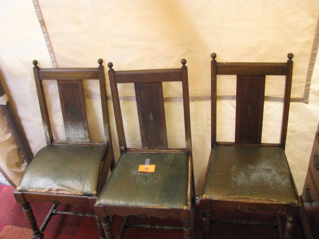 three matching project dining room chairs