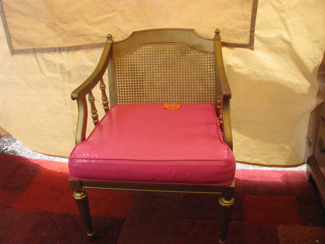 Vintage woodwicker chair with hot pink seat