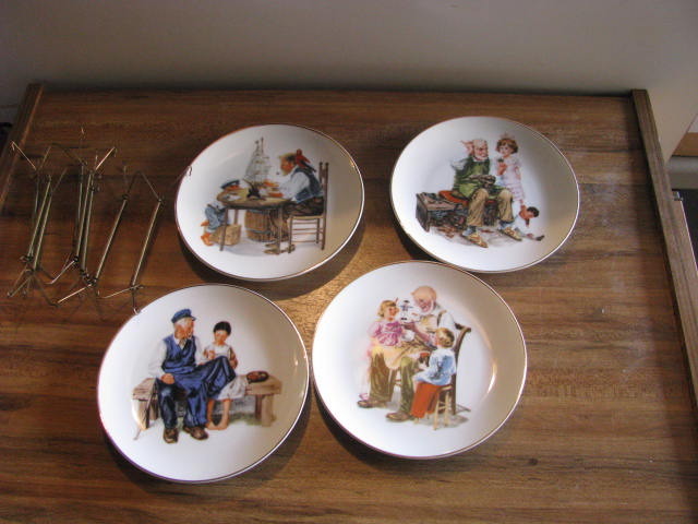 4 Norman Rockwell plates with hangers