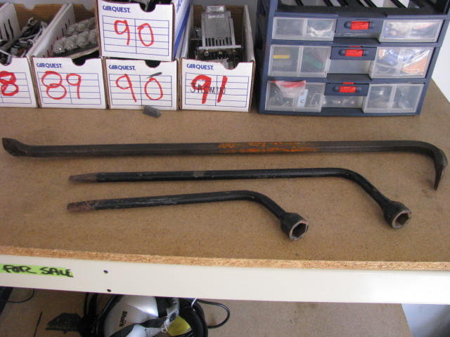 crow bar and two lug wrenches