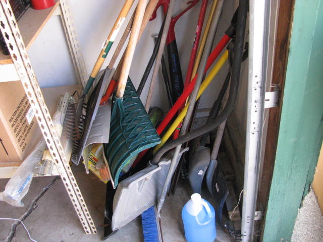 Giant lot of shovels and garage tools