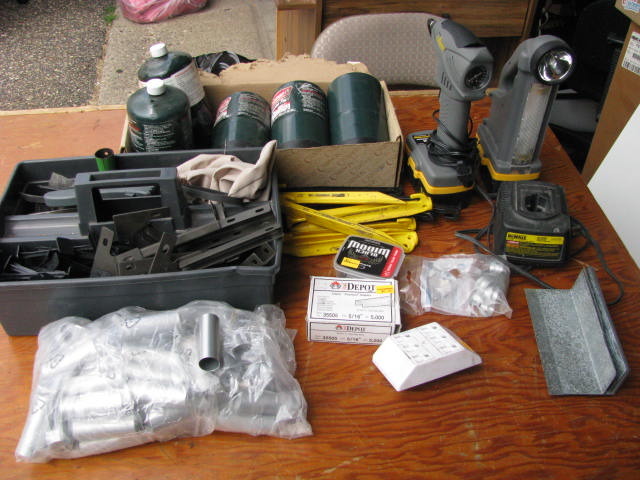 propane tanks, tent stakes air pump and light plus more