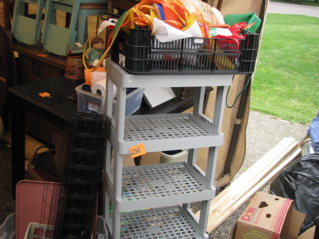 plastic shelves containers pails and sale banners