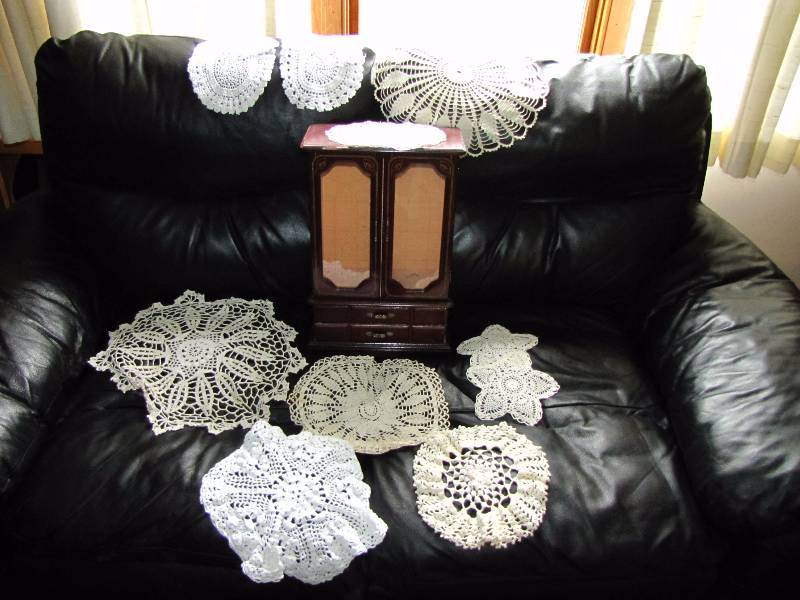 handmade doilies and jewelry cabinet
