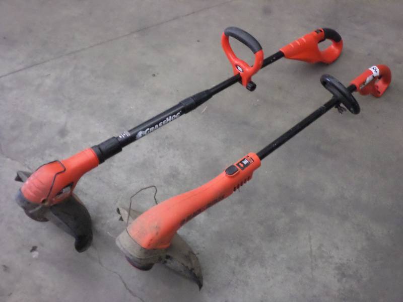 lot 45 image: (2) Black  & Decker Electric Grass ...