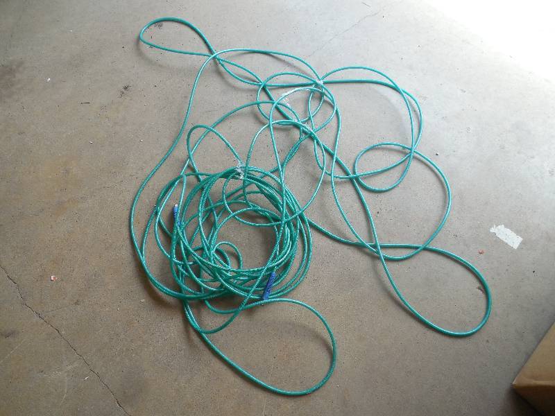 100 roll of 14inch polyurthane hose with threaded ends