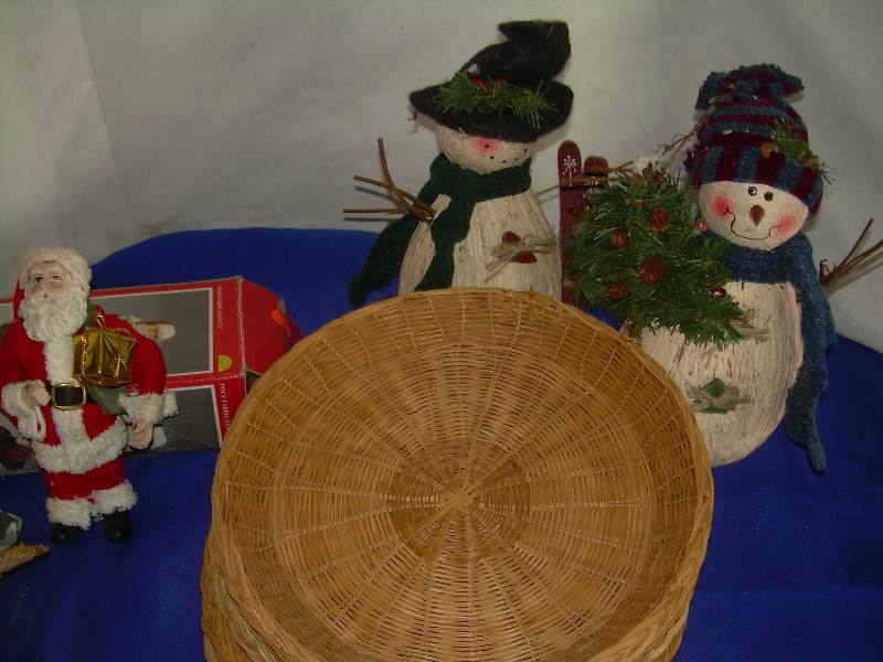 X-mas figurenes and wicker plate holder.