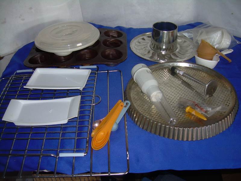 Misc bake ware, measuring spoons, etc