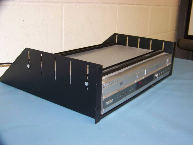 lot 92 image: Sony, DVD  VCR Combo Player with Remote Control in Middle Atlantic Rack Shelf