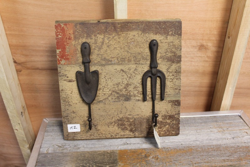 lot 152 image: Cast Iron Coat Hook on Barnwood