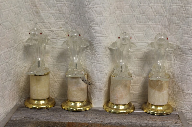 lot 232 image: Clear Plastic Dolphins on Marble Stands