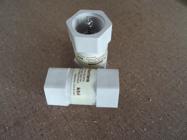 1 spring load check valve