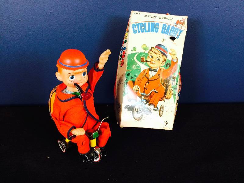 lot 38 image: Vintage Tin Cycling Daddy w Box
