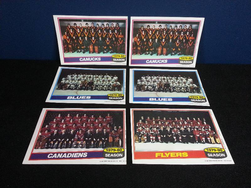 lot 129 image: 1980 Topps Team Pin-ups Hockey - Canucks, Blues, Flyers, Canadiens
