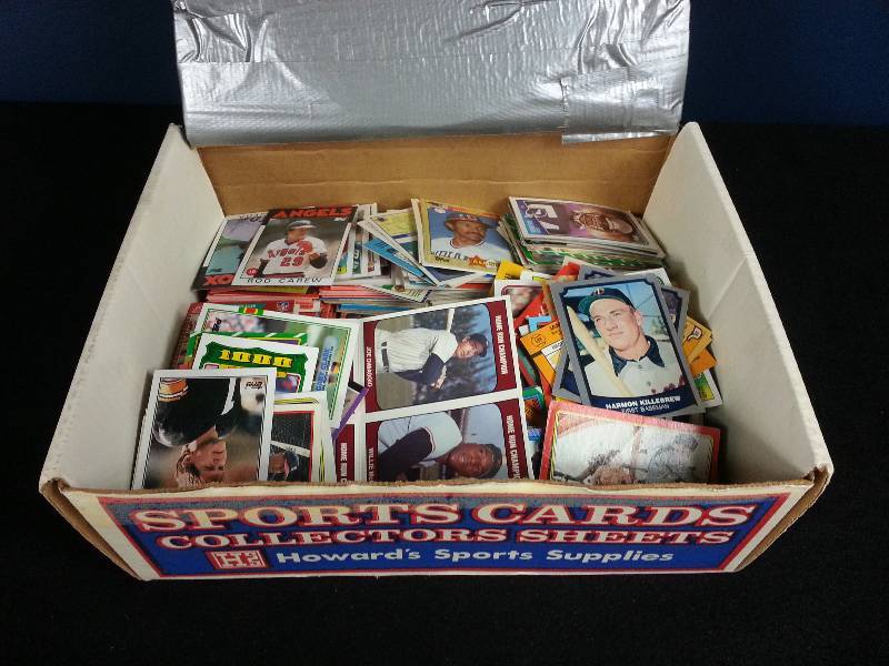 lot 131 image: Random Box of Baseball, Football, Star Wars Cards