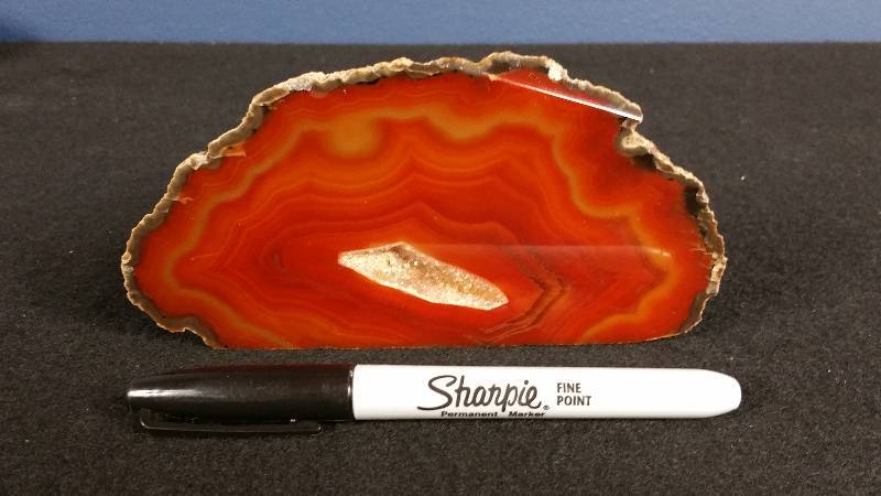 lot 190 image: A Stunner  Cut and Polished Reds w Crystals