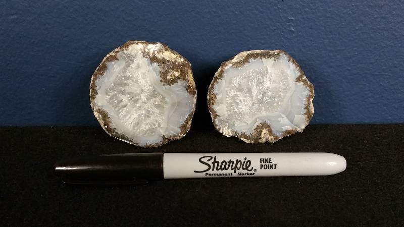 lot 192 image: Crystal Dinosaur Egg Geode - In Two Halves
