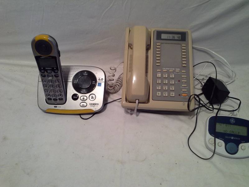 lot 28 image: Two phones WCaller Id Module