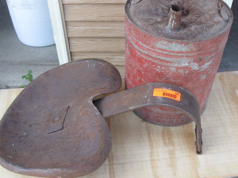 Tractor seat & gas can